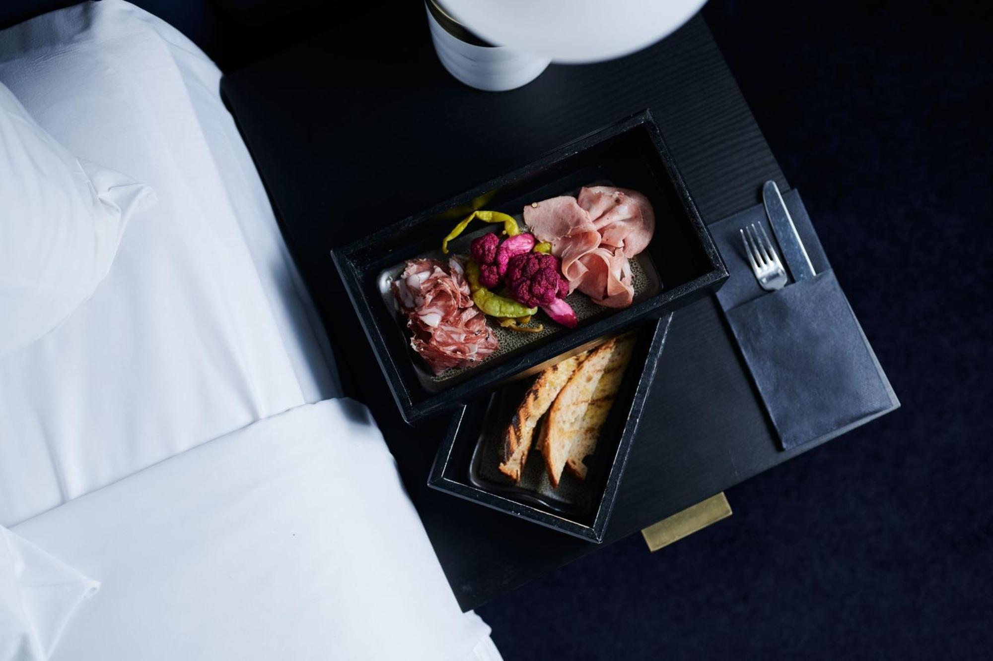 Midnight Hotel, Autograph Collection Canberra Luaran gambar A first-class meal on board a Lufthansa plane